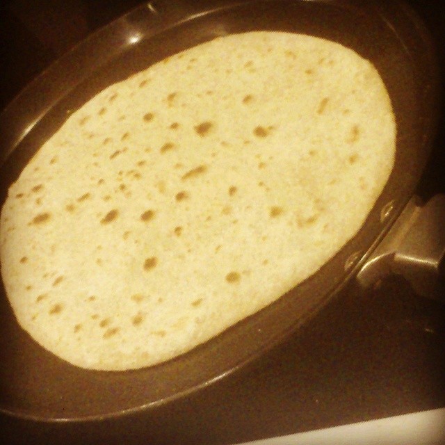 a tortilla being cooked in an oven