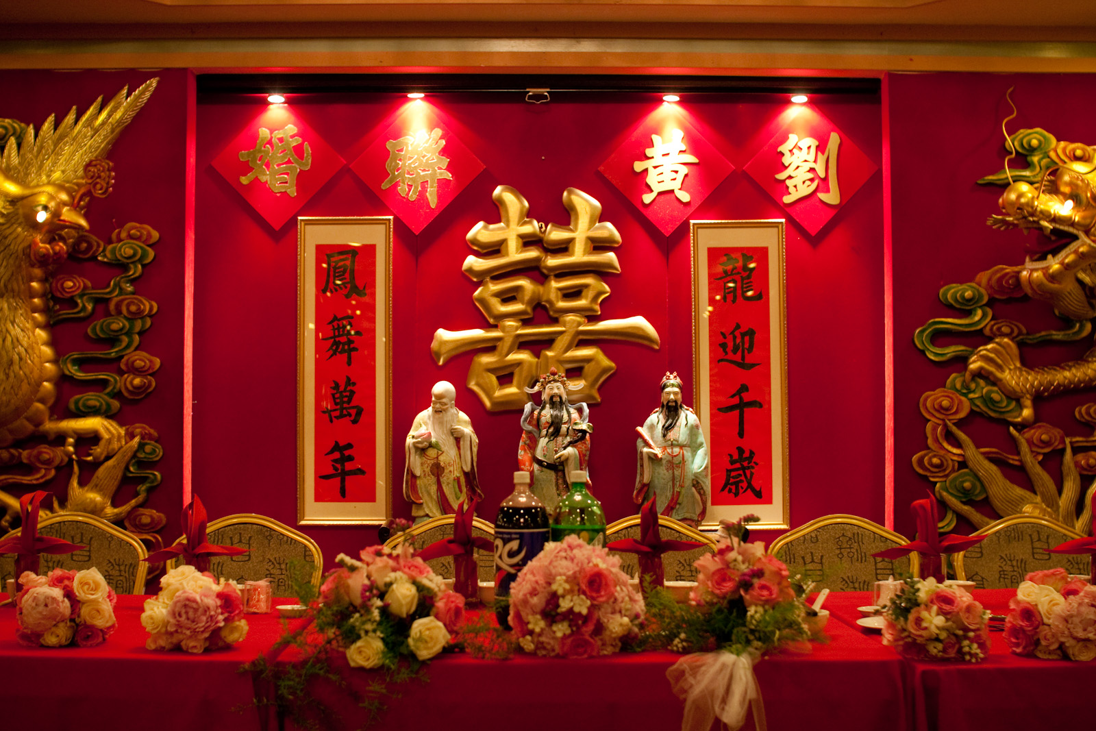 the red and gold decorations are decorated with asian writing