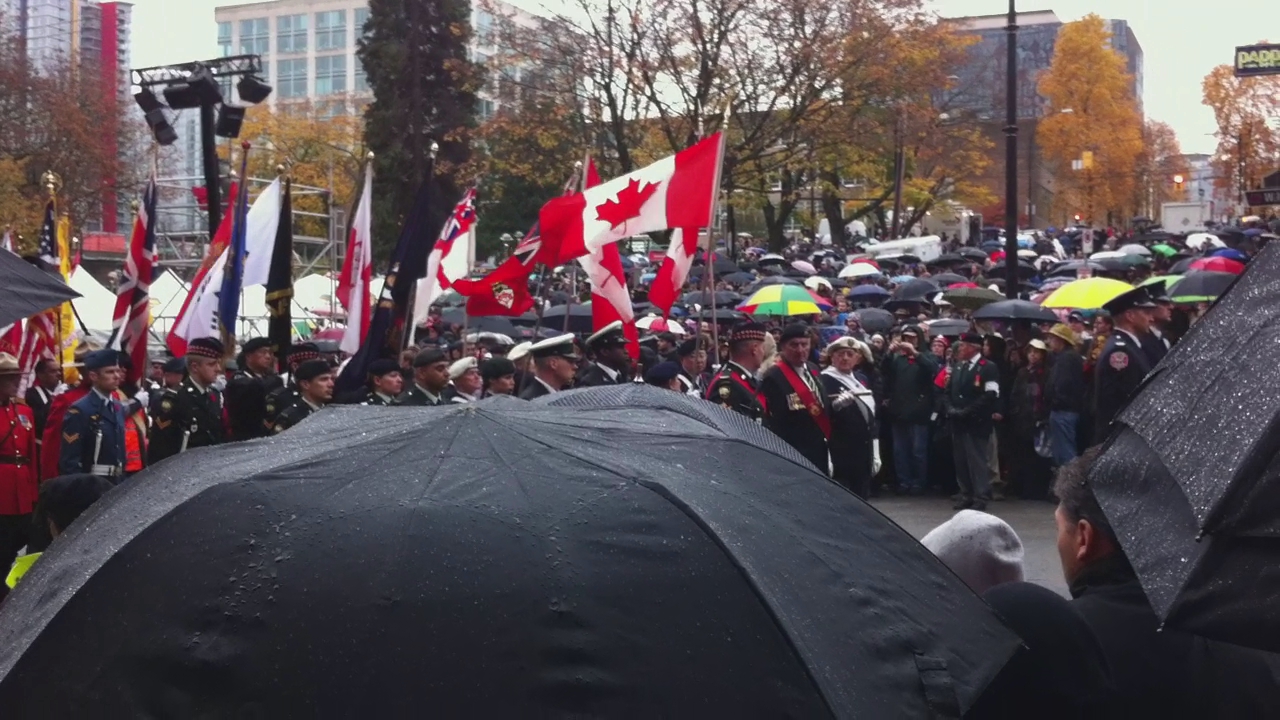 people are protesting outside in a protest with umbrellas