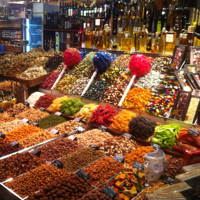a store display with assorted dried fruits and nuts
