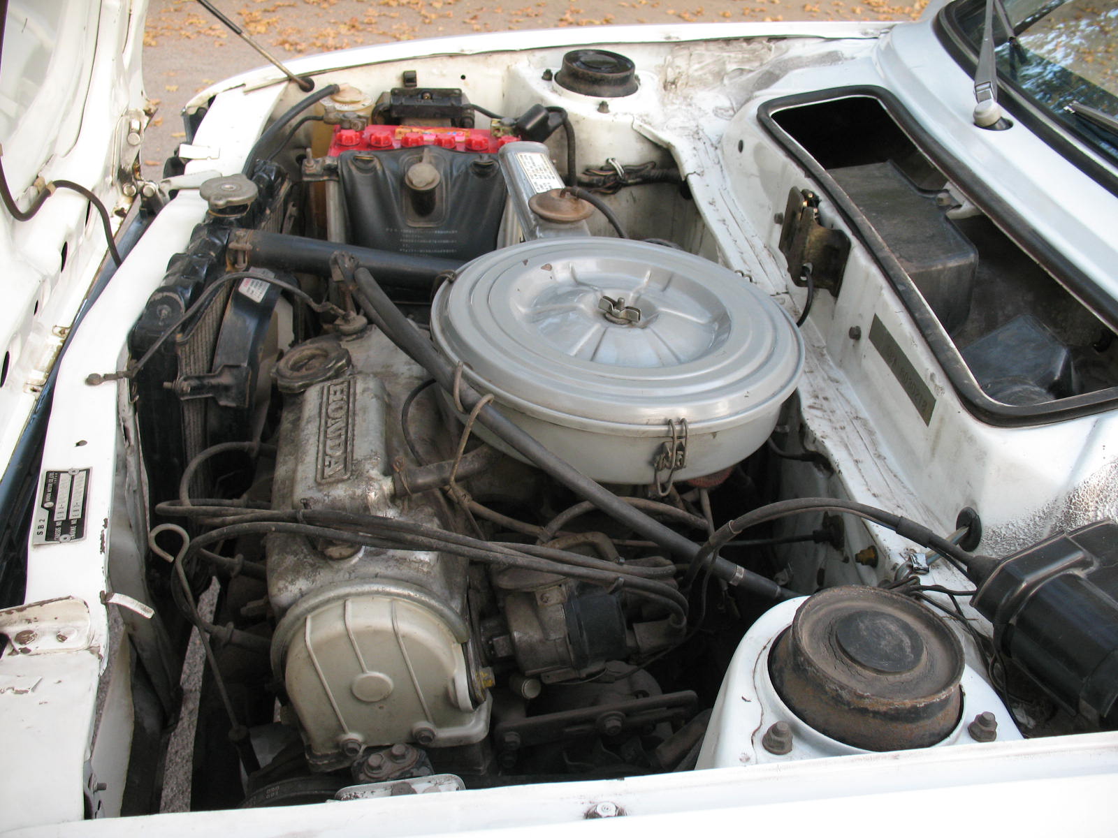 a car engine with its cover closed on it