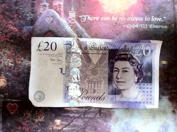 a british money bill with a portrait of queen elizabeth on the front