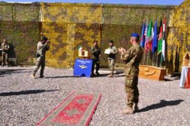 military officials practicing a game on a gravel surface