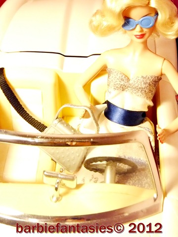 barbie dolls is setting up a boat to dry themselves