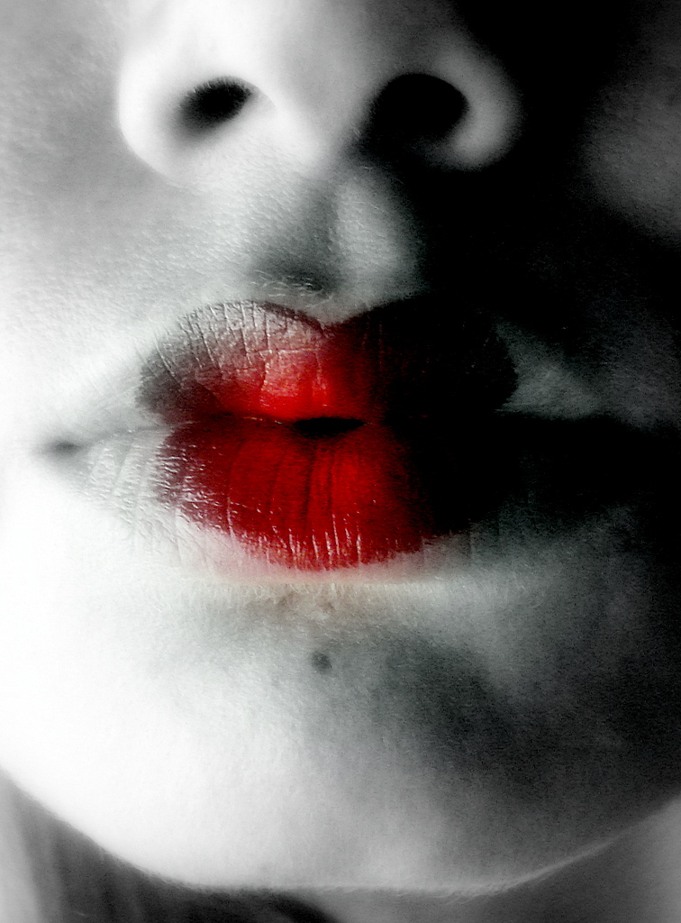 black and white pograph of a woman's lips