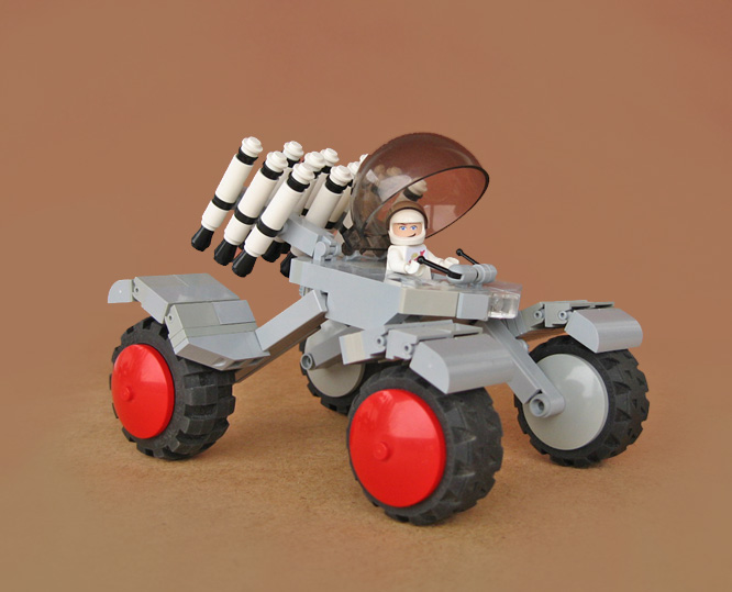 a red and white model of an object with a man in it