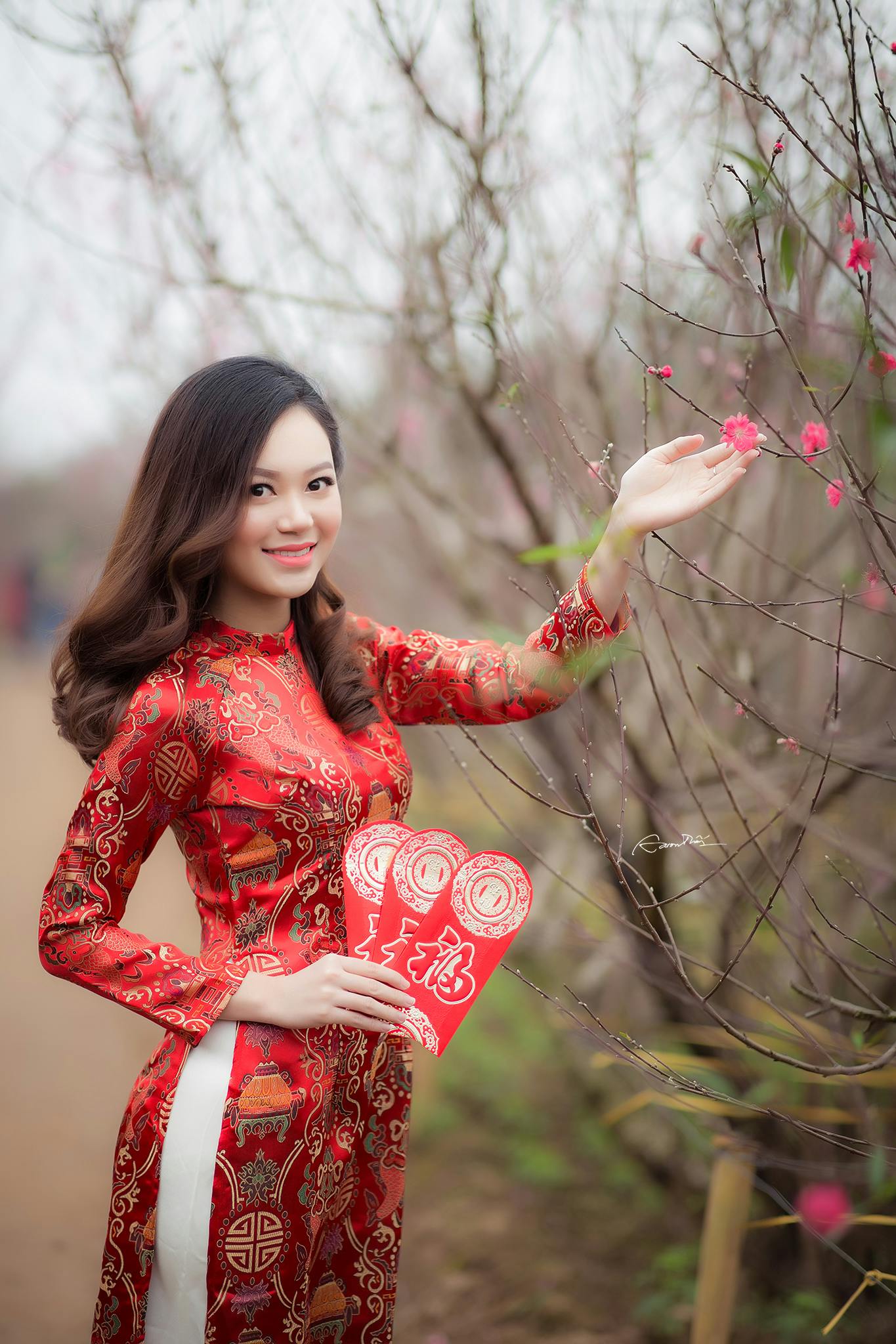 a woman in a red dress posing for a picture, a picture, inspired by Cui Bai, flowery, february), square, 2 3 years old