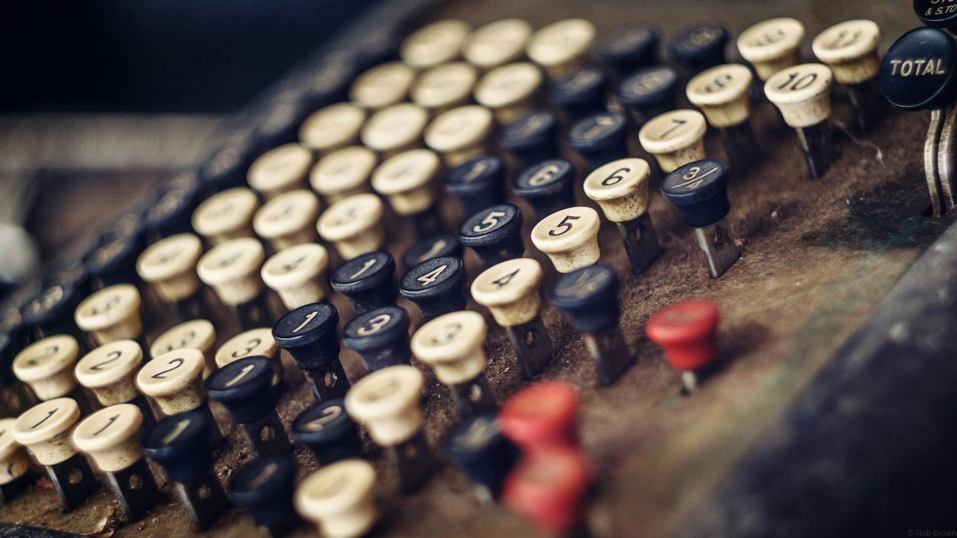 a close up of the keys of an old typewriter, by Emma Andijewska, unsplash, computer art, algebra, buttons, 15081959 21121991 01012000 4k, newton's cradle