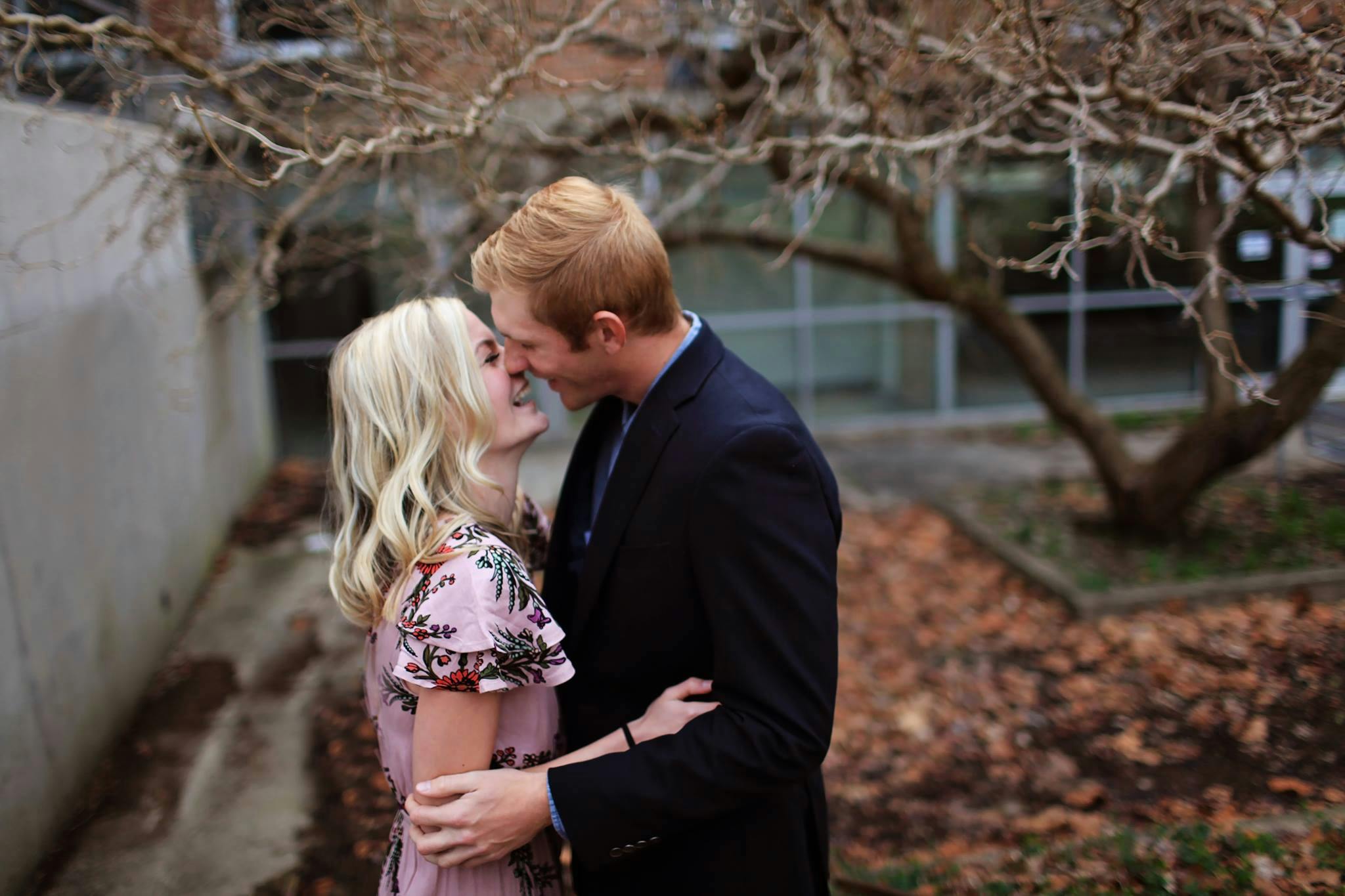 a man and a woman standing next to each other, a portrait, by Marshall Arisman, pexels, kissing together cutely, jenna barton, lightly dressed, university