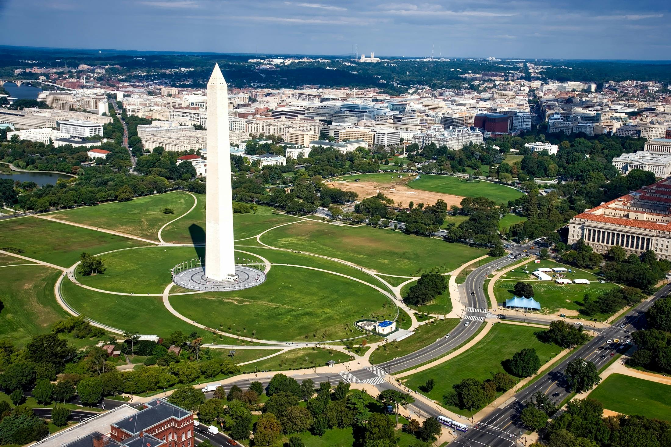 a view of the washington monument from the air, by Washington Allston, pexels contest winner, art nouveau, avatar image, grass field surrounding the city, slide show, wide high angle view