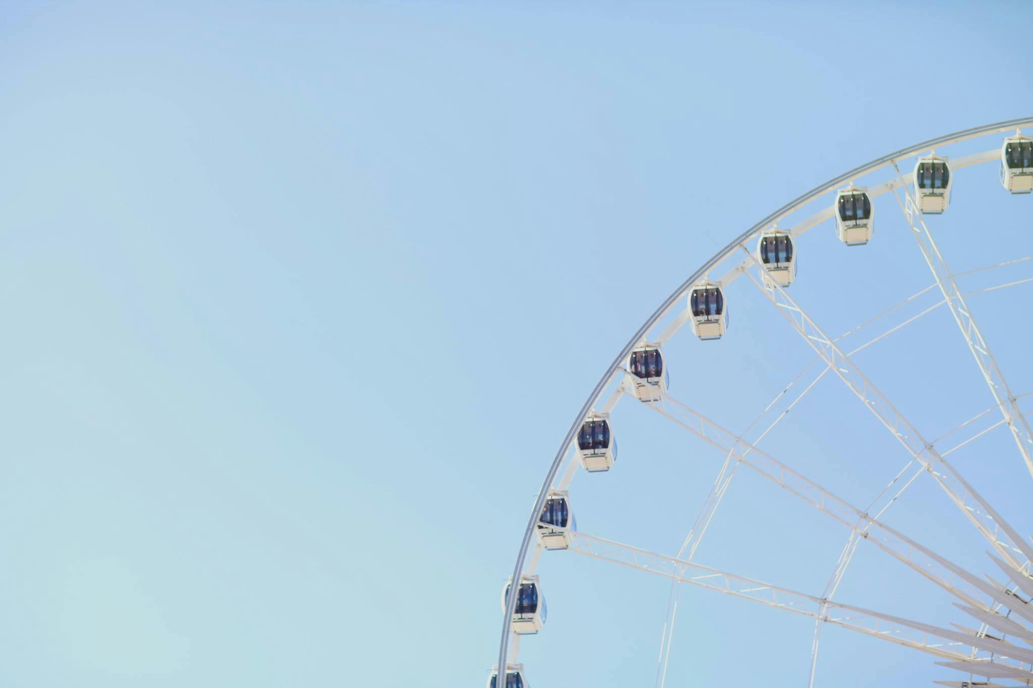 a ferris wheel in front of a blue sky, pexels contest winner, aestheticism, pale blue, ariana grande photography, gondolas, profile image