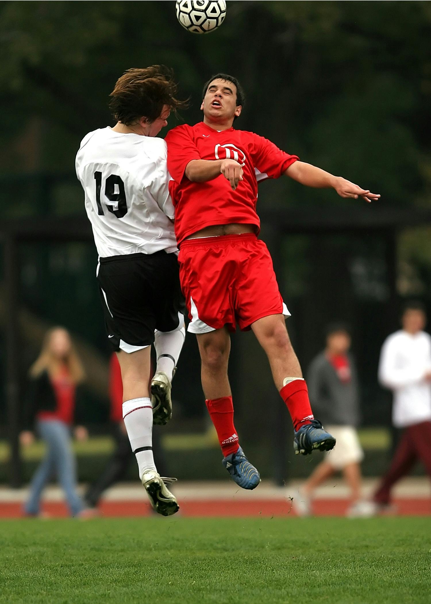 a couple of young men playing a game of soccer, flickr, happening, ultra - high jump, promo image, high forehead, dirk dzimirsky