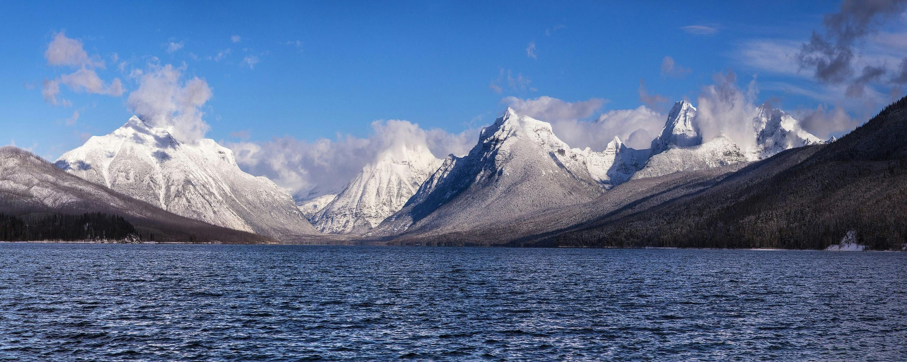 a large body of water with mountains in the background, by Alexander Johnston, pexels contest winner, snowy fjord, listing image, fan favorite, panorama