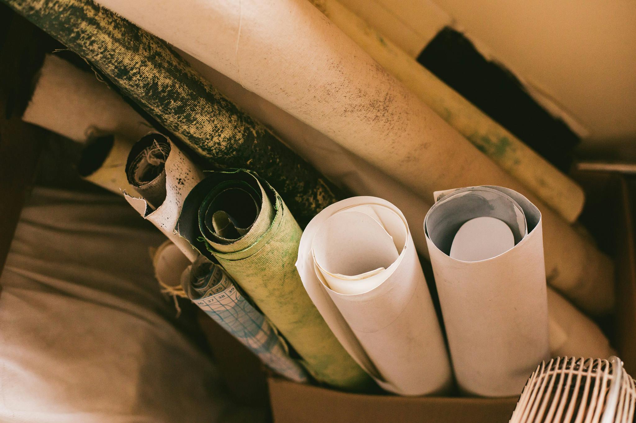 a box filled with rolls of toilet paper and rolls of toilet paper, unsplash, arts and crafts movement, architectural painting, rusty pipes, worn mono - yellow wallpaper, thumbnail