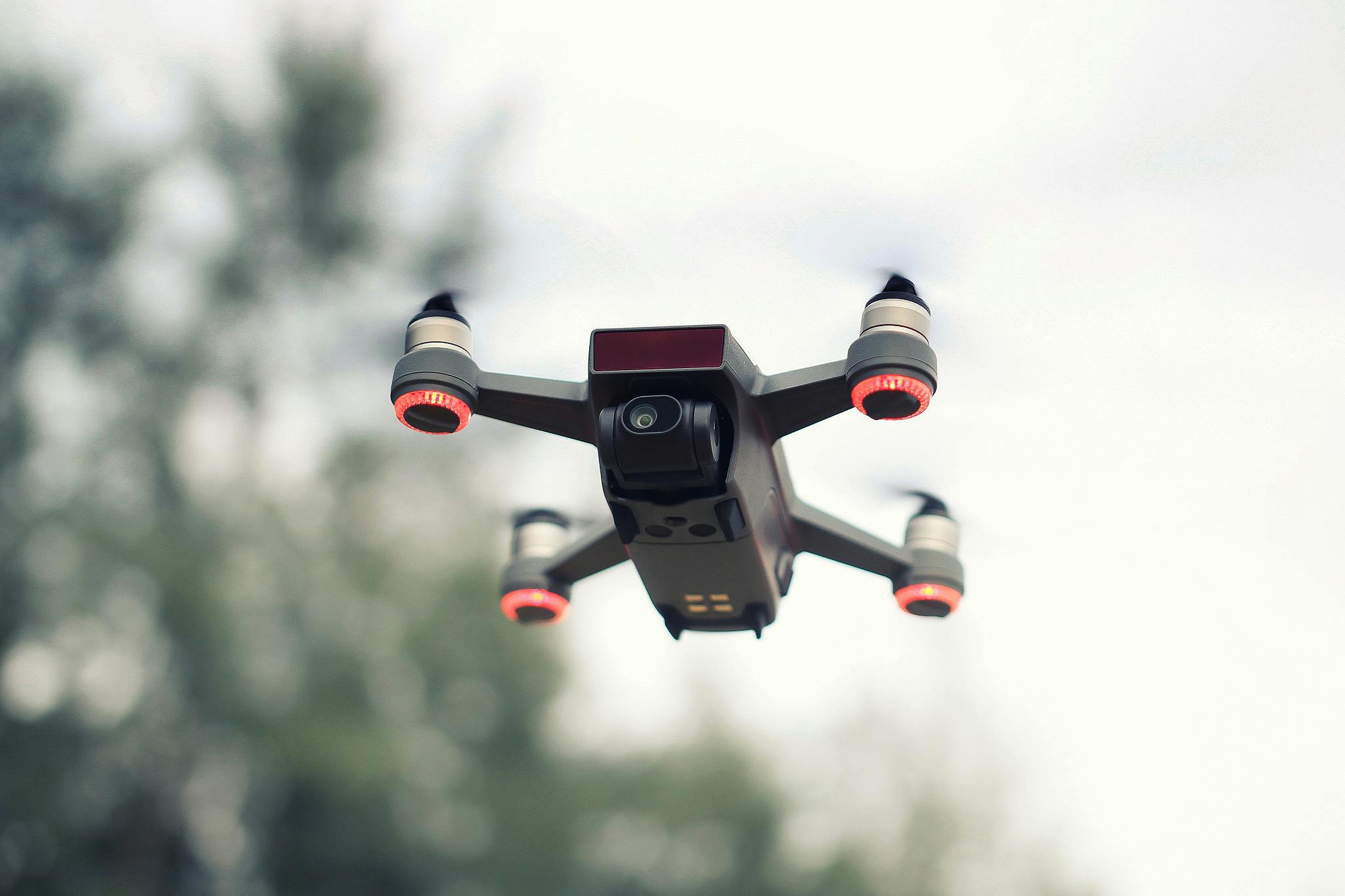 a close up of a drone flying in the sky, pexels, mini model, 1924, digital still, vintage color