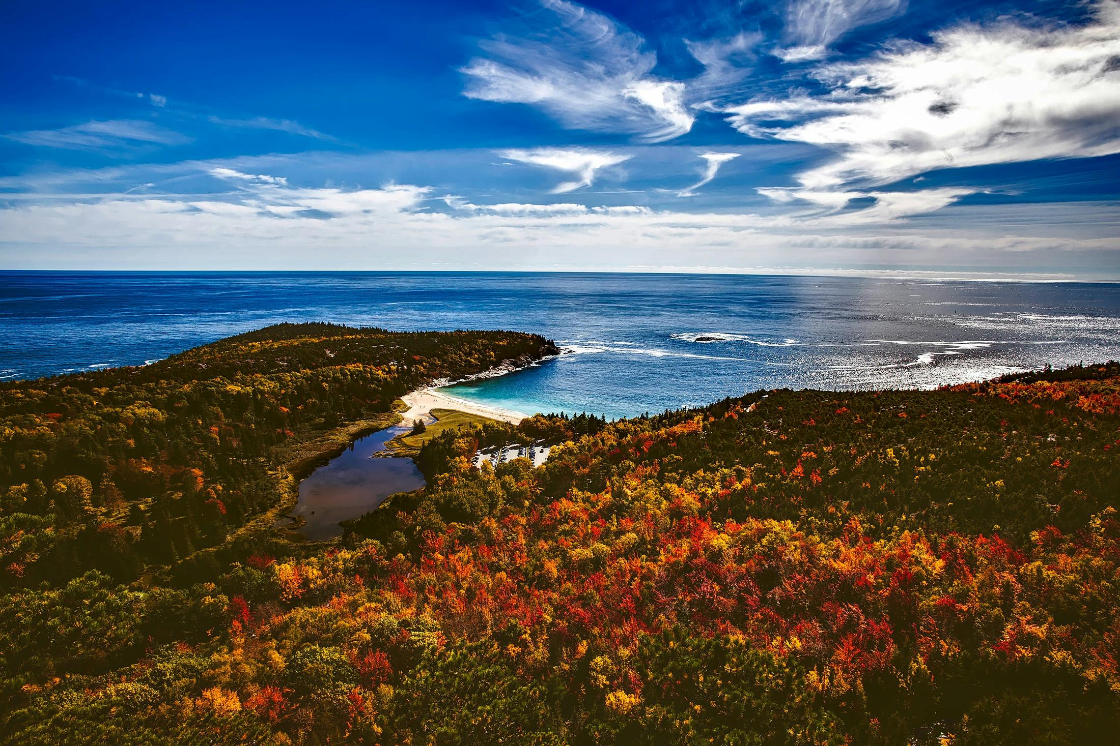 a view of the ocean from the top of a hill, by Julia Pishtar, unsplash contest winner, vibrant autumn colors, square, celtics, lagoon