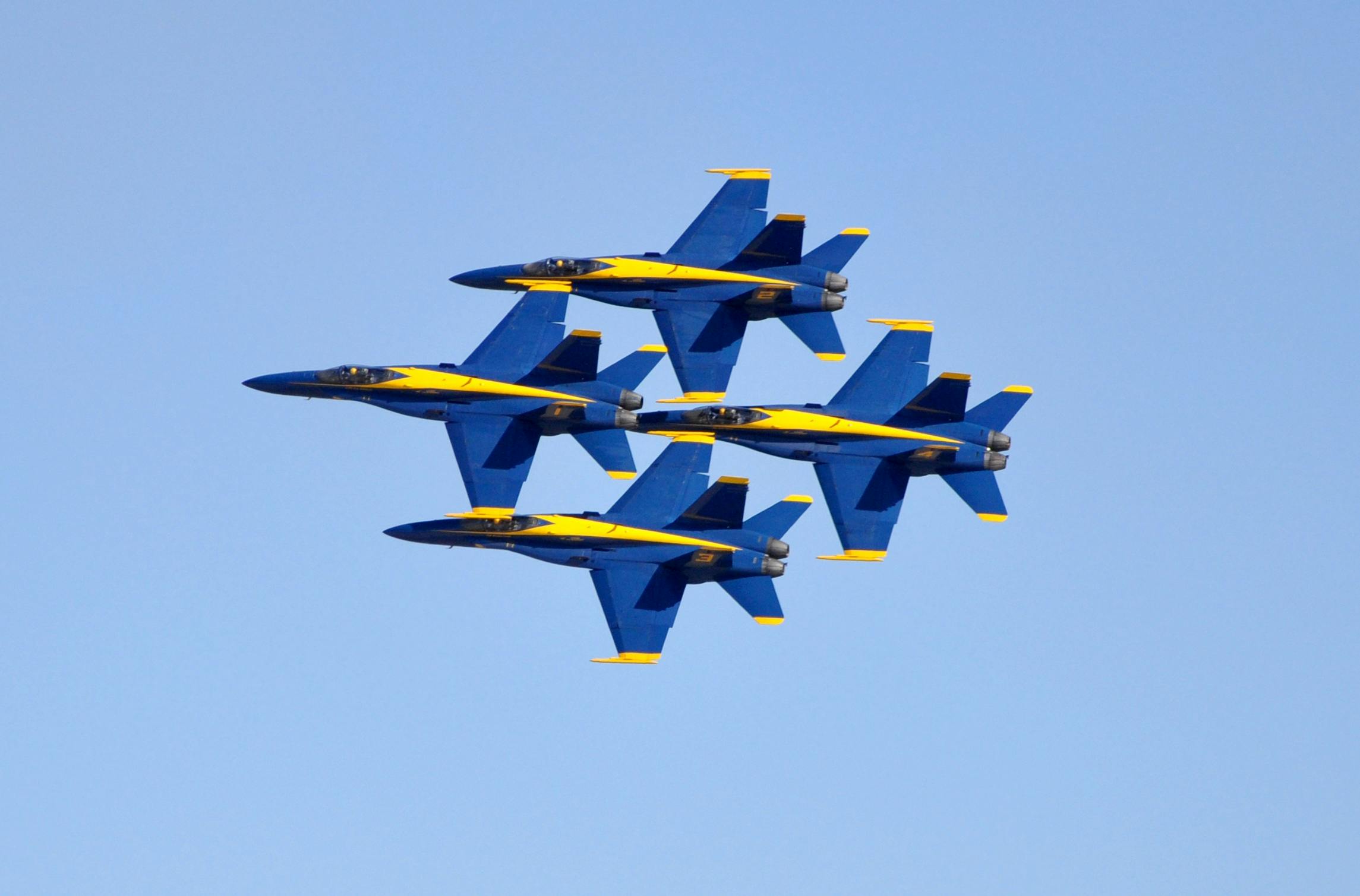 an image of blue angels flying in formation