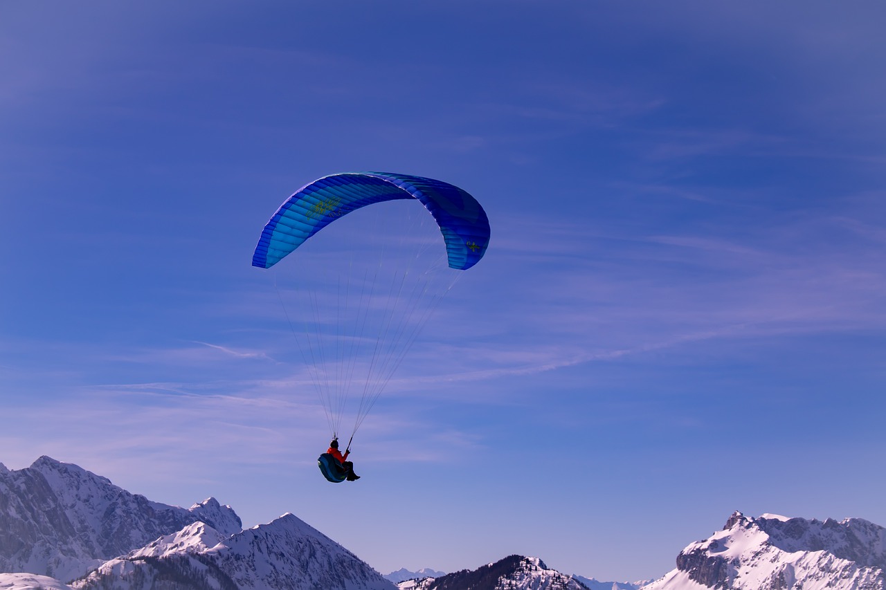 a person that is in the air with a parachute, a picture, by Erwin Bowien, shutterstock, stunning ski, stock photo