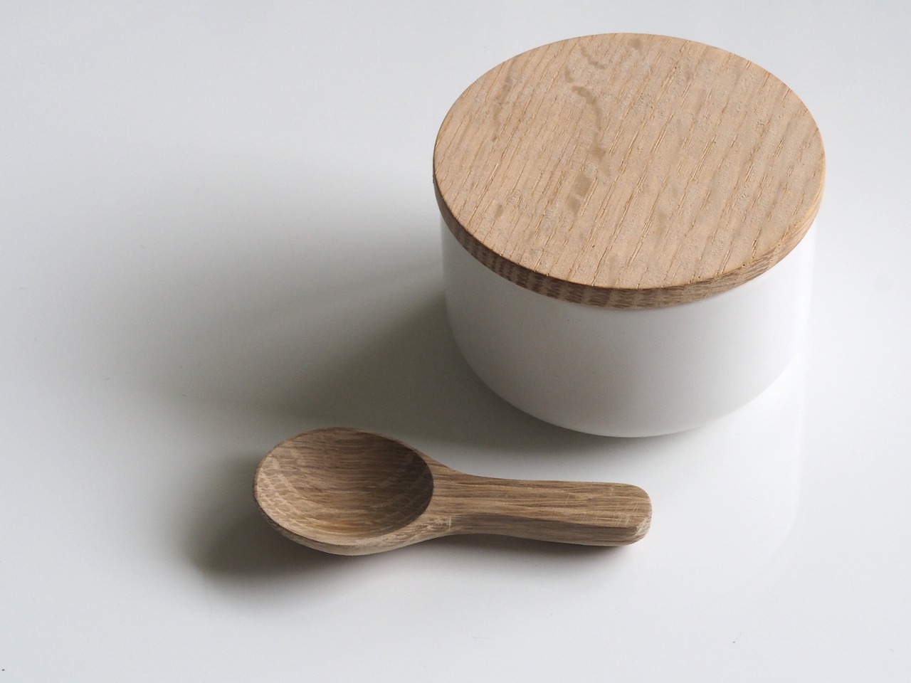 a white container with a wooden spoon next to it, inspired by Jakob Emanuel Handmann, ello, けもの, oak, small scale