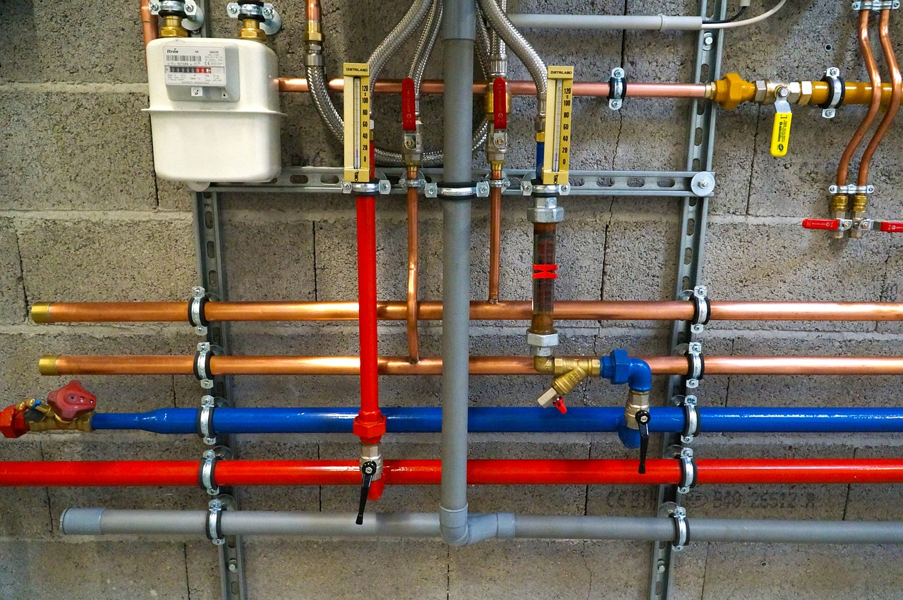 a bunch of pipes that are connected to a wall, a photo, colour corrected, hydraulics, mechanical accents!, above view