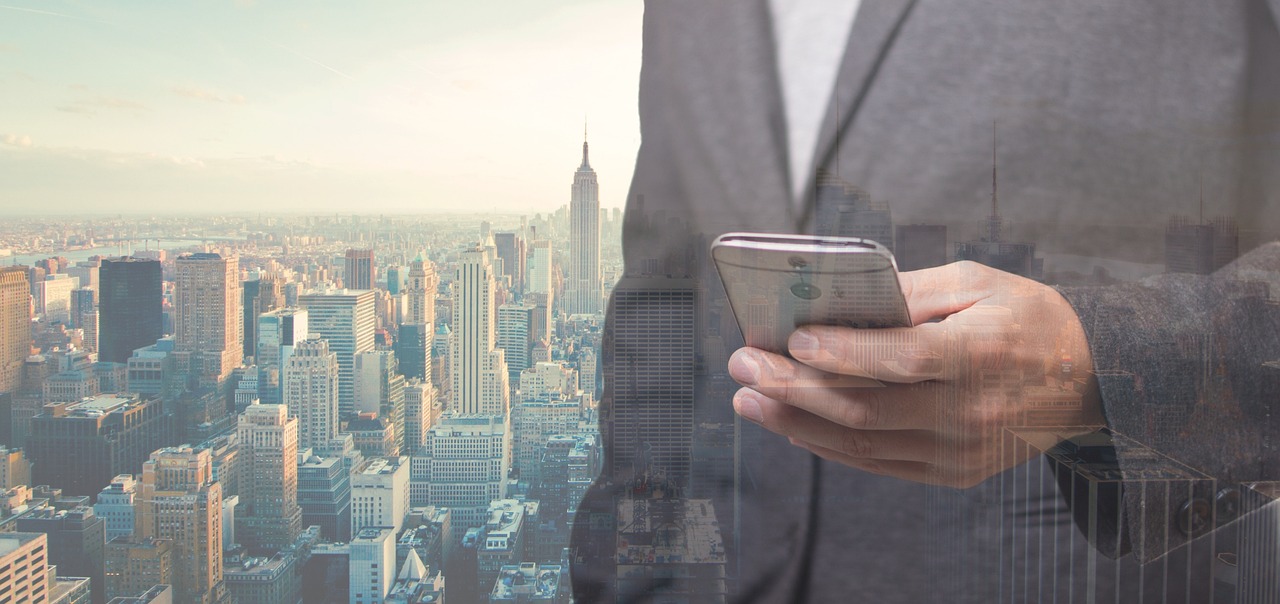 a man in a suit holding a cell phone, a picture, by Barron Storey, pexels, digital art, new york city background, istockphoto, composite, hazy