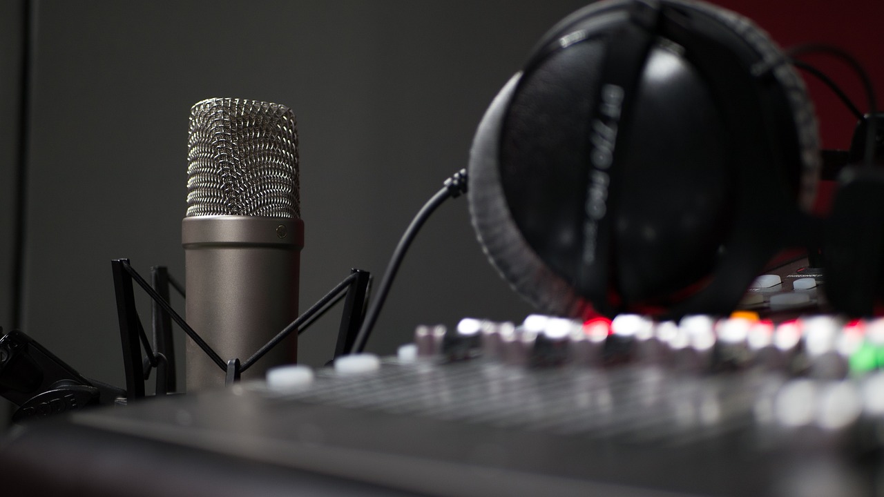a close up of a microphone in a recording studio, a picture, by Konrad Witz, shutterstock, happening, with headphones, pc screenshot, on grey background, studio ghibi