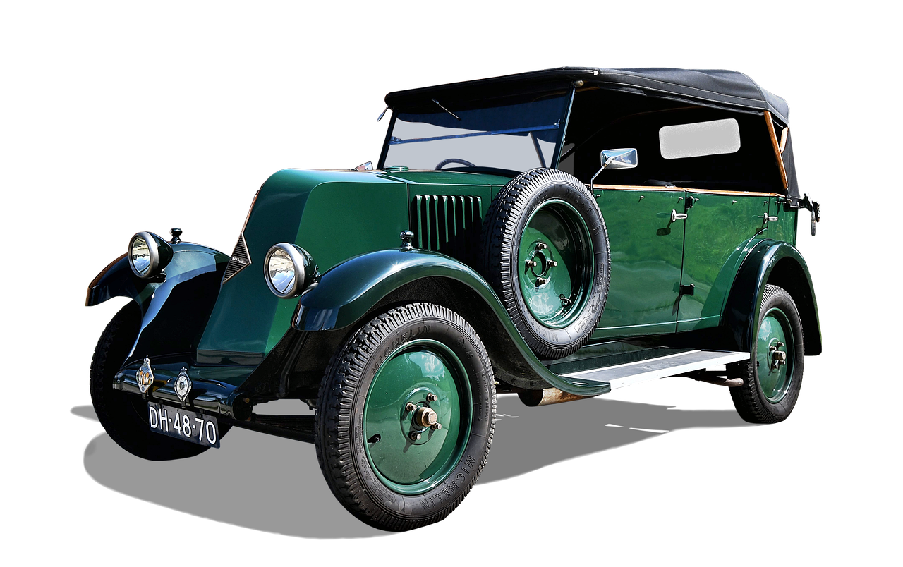 an old green car on a black background, by Peter Scott, trending on pixabay, art nouveau, with a roof rack, 8k artistic 1920s photography, full body wide shot, france