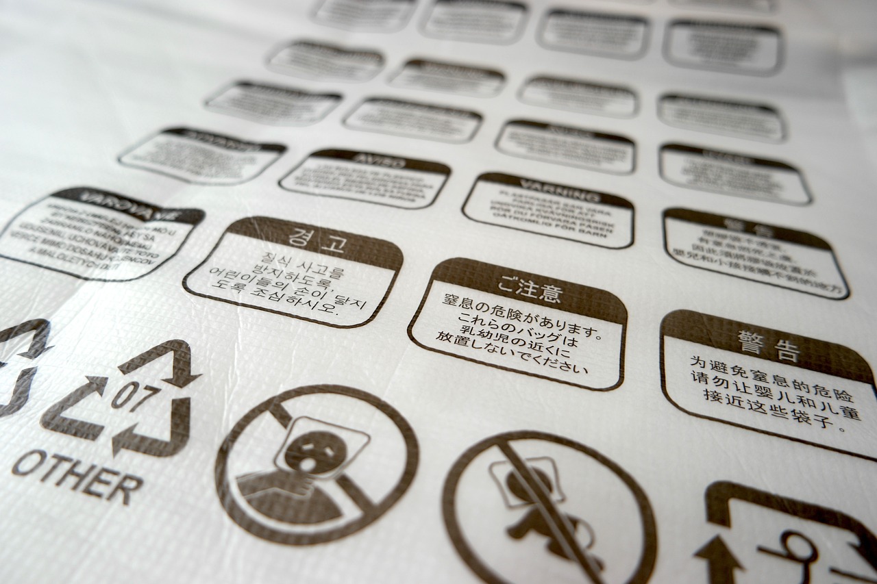 a close up of a sign on a sheet of paper, a silk screen, by Kiyoshi Yamashita, flickr, packaging design, pictogram, warning, with labels. high quality
