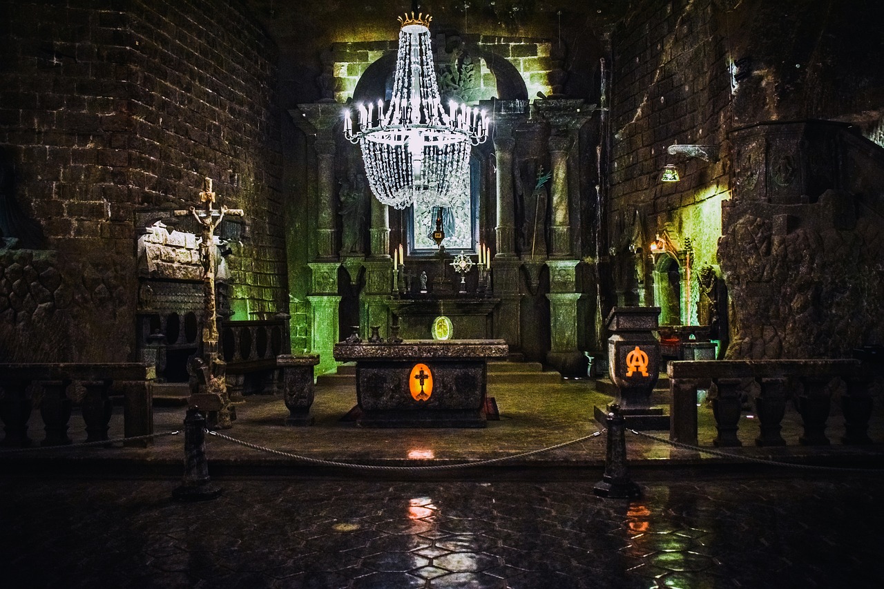 a church with a chandelier hanging from the ceiling, by Adam Szentpétery, flickr, romanesque, underground lake, gloomy medieval background, sacrificial altar, set photo