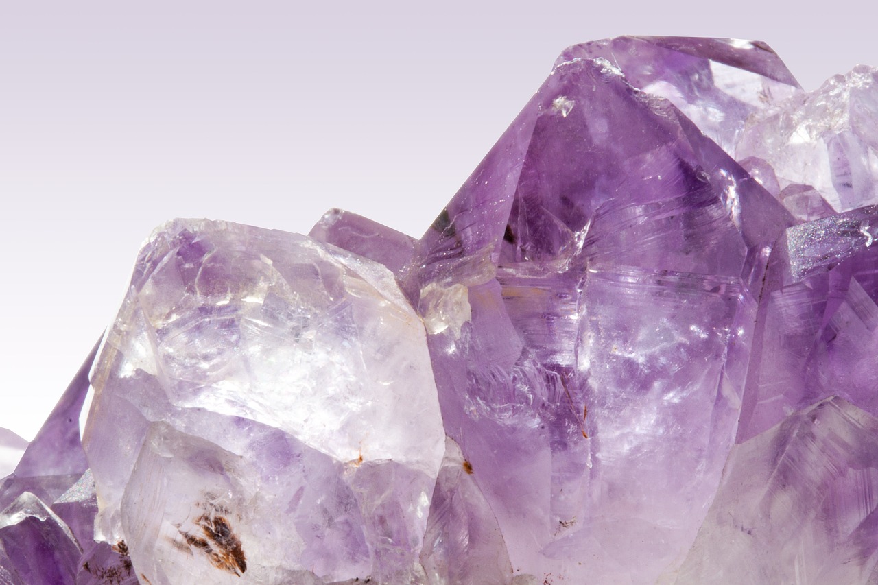 a cluster of purple crystals sitting on top of each other, shutterstock, background image, hyperdetailed, wideshot, ground-breaking