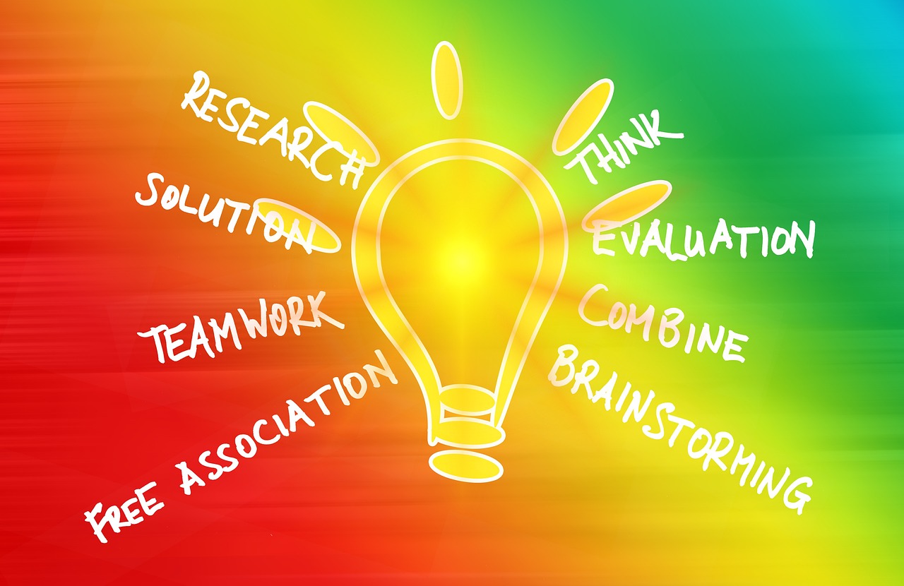 a drawing of a light bulb on a colorful background, teaching, information, staff, words