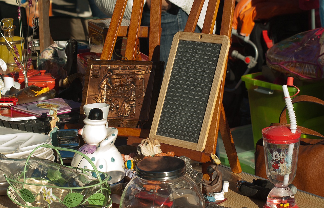 a table topped with lots of assorted items, a photo, by Ramón Silva, flickr, folk art, solar panels, chalkboard, modern very sharp photo, presenting wares