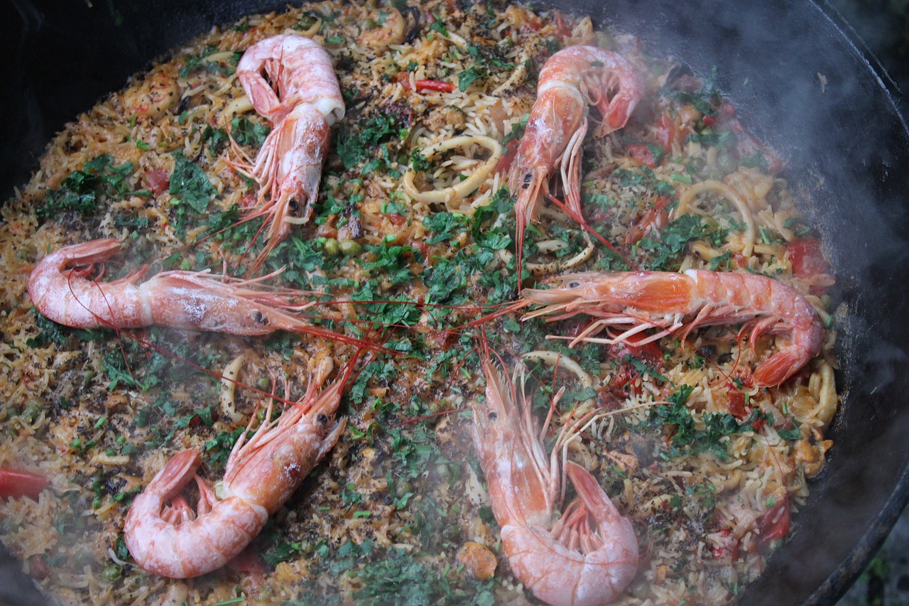 a pan filled with cooked shrimp and rice, by Matteo Pérez, hurufiyya, depth detail, hydra with eight heads, adult, breeding