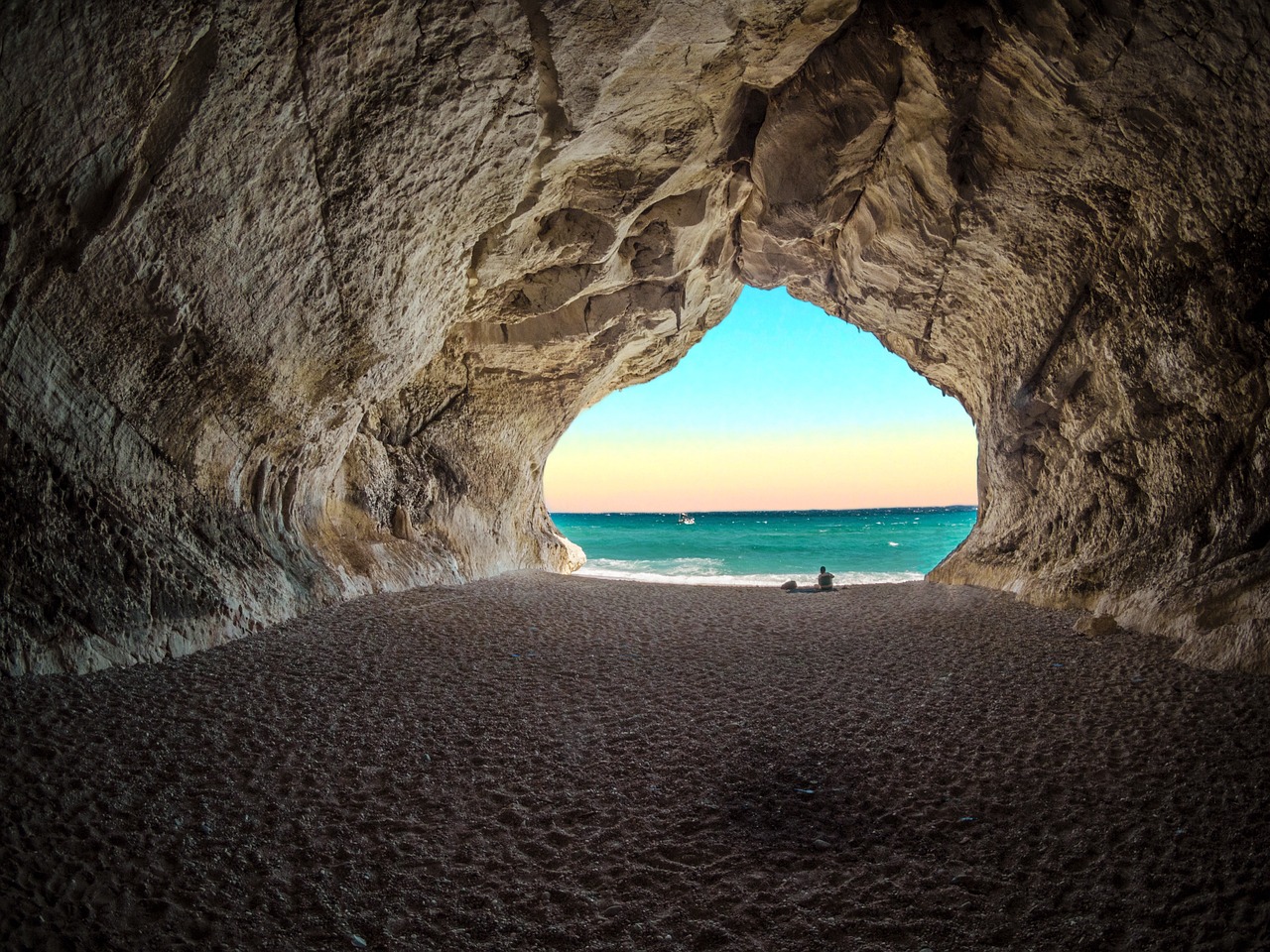 a cave filled with lots of sand next to the ocean, by Francesco Raibolini, 4k uhd wallpaper, italian beach scene, inside the tunnel, wonderful details