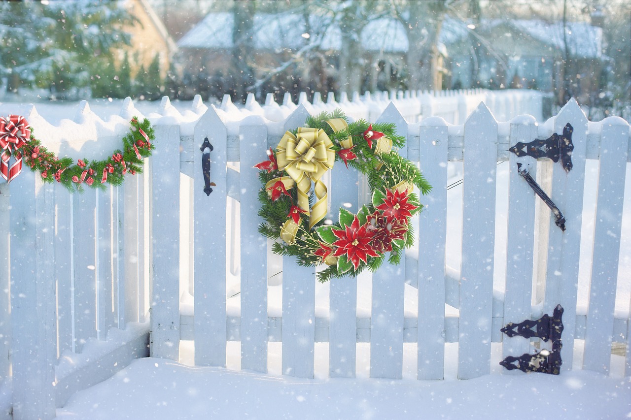 a white fence with a christmas wreath on it, a picture, shutterstock contest winner, snow flurry, 1 6 k, gate, adorable design