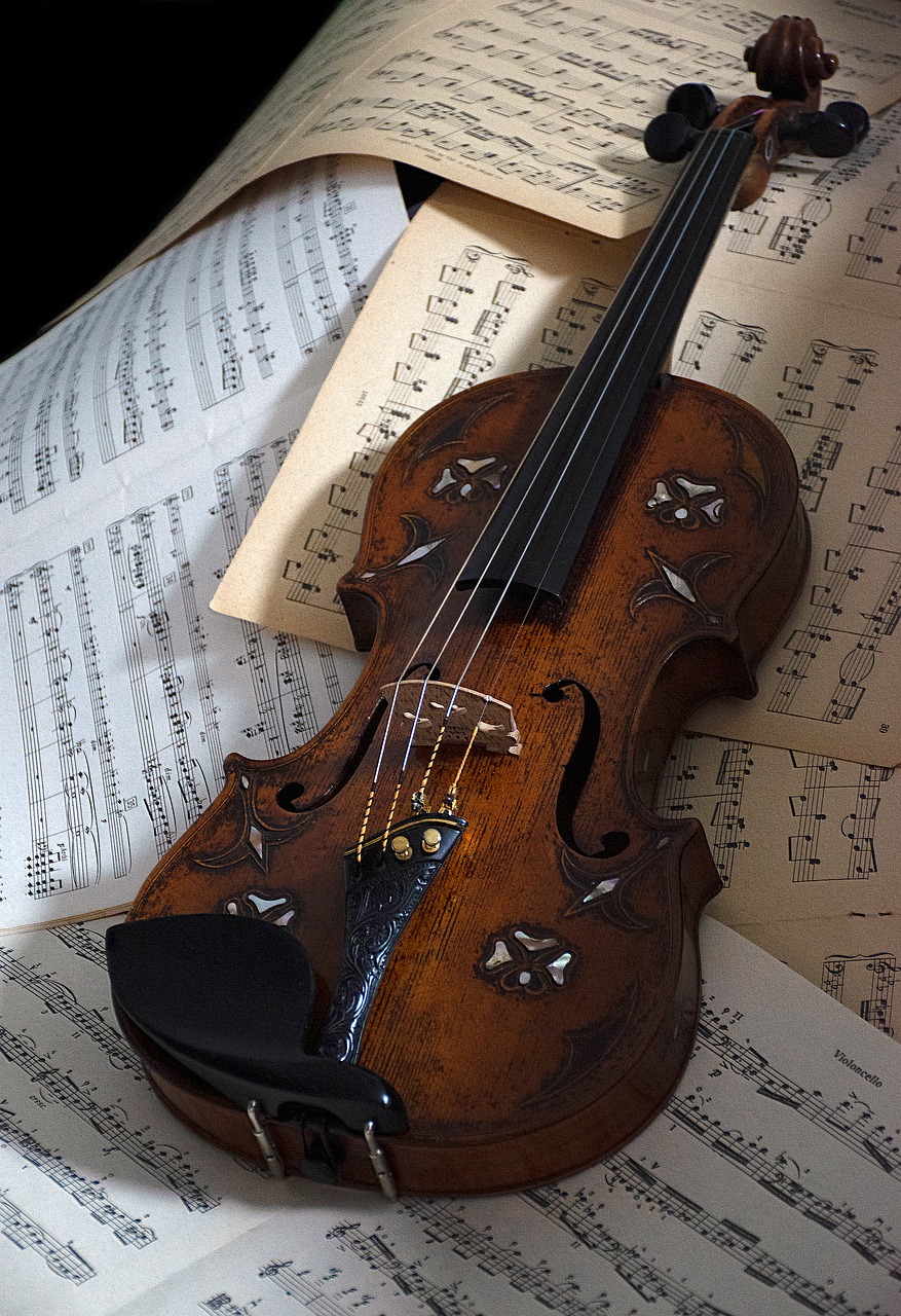 a violin sitting on top of a sheet of music, by Eugeniusz Zak, flickr, baroque, cursed baroque with ebony inlay, highly detailed and beautiful, stained”, 1 7 9 5