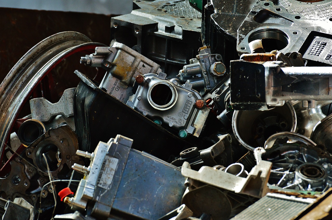 a pile of junk sitting on top of a table, by Ludwik Konarzewski, pexels contest winner, assemblage, diesel engine, damaged camcorder video, abstract holescape, 2506921471