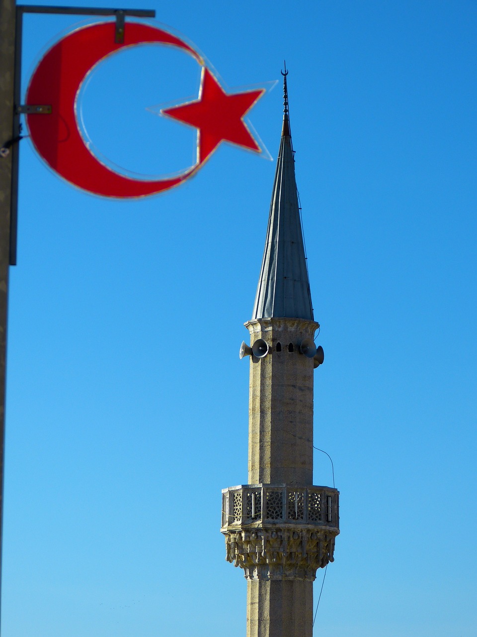 a clock tower with a red star on top of it, inspired by Fikret Muallâ Saygı, flickr, hurufiyya, lead - covered spire, photo taken on a nikon, tourist destination, portlet photo