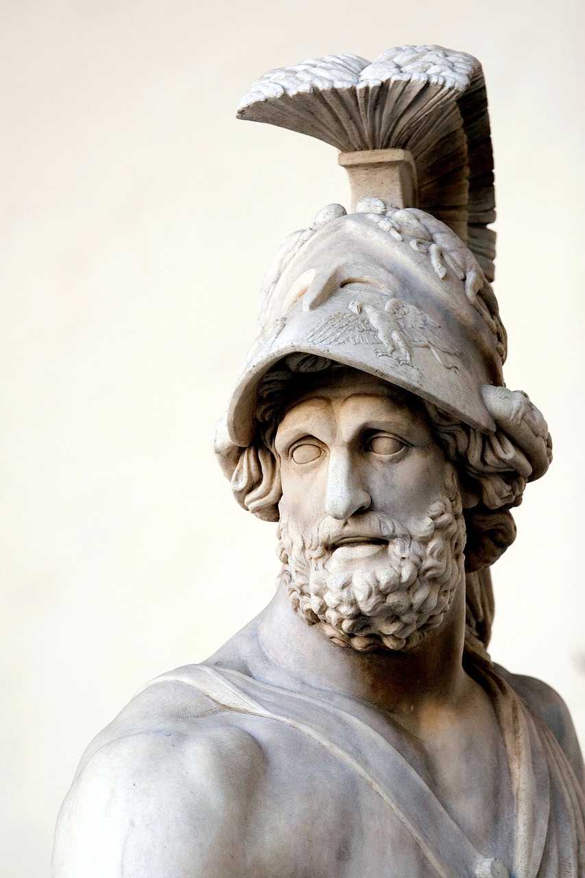 a close up of a statue of a man wearing a helmet, inspired by Exekias, shutterstock, archwizzard in a hat, beautiful look, roma, serene expression