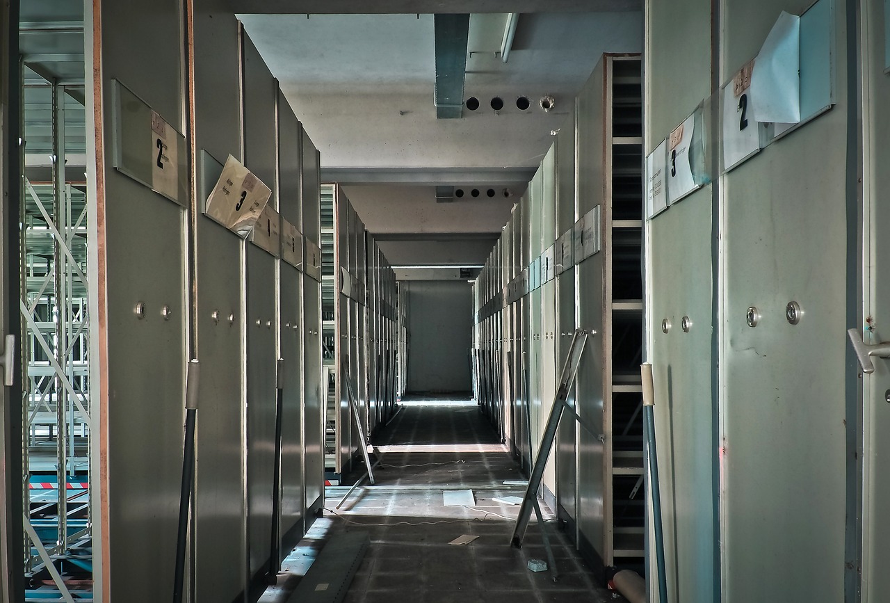 a long hallway filled with lots of metal lockers, by Mirko Rački, flickr, bauhaus, inside a decayed operating room, lomo, supercomputer, cell bars