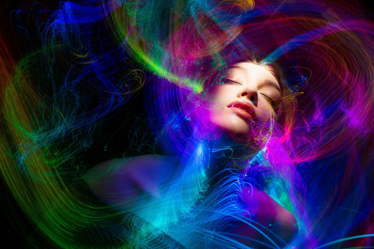 a woman with colorful lights in her hair, by Eugeniusz Zak, digital art, dreaming illusion, electric swirls, advertising photo, colorful dream