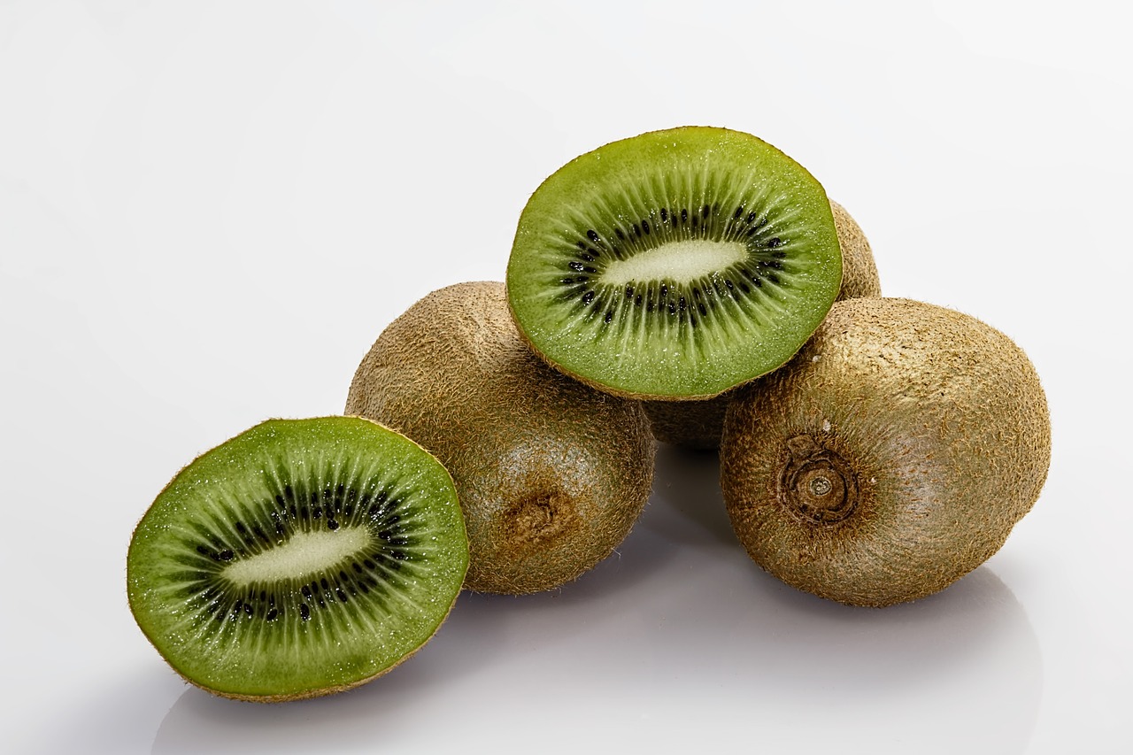 a group of kiwis sitting on top of each other, official product photo, it\'s name is greeny, 千 葉 雄 大, with brown skin