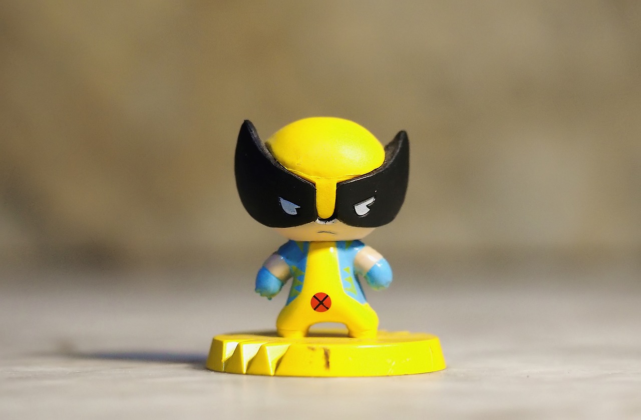 a close up of a toy figure on a table, a picture, pexels, toyism, wolverine, micro detailed, video game item, isolated