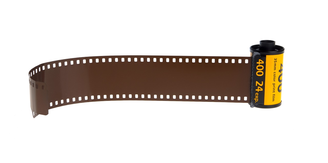 a roll of 35mm 35mm 35mm 35mm 35mm 35mm 35mm 35mm 35mm 35mm 35mm 35mm 35, a stock photo, art deco, with blunt brown border, high resolution product photo, movie poster with no text, cinematographic photo