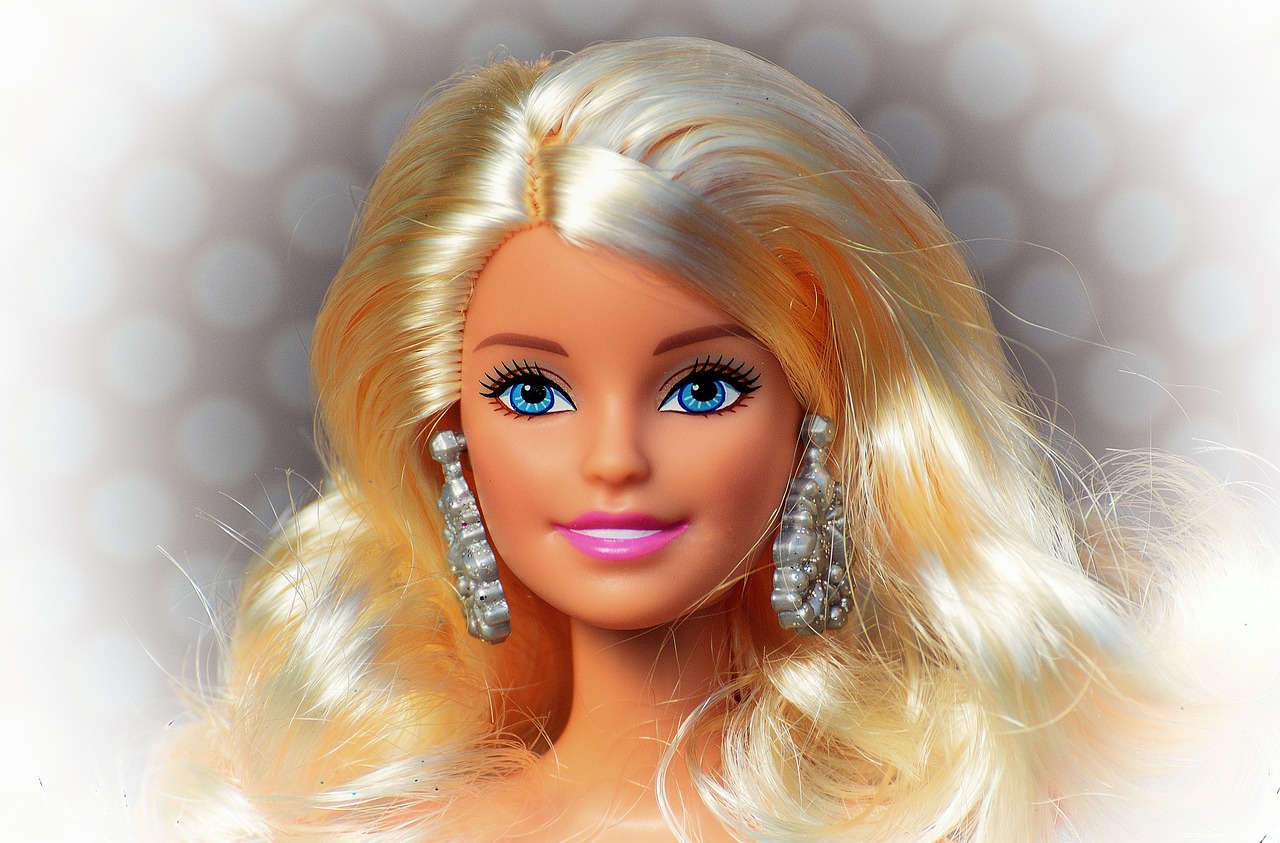 a close up of a barbie doll with blonde hair, a picture, by Mario Bardi, pixabay, pop art, gleaming silver, toy commercial photo, 🎨🖌️, headshot photo