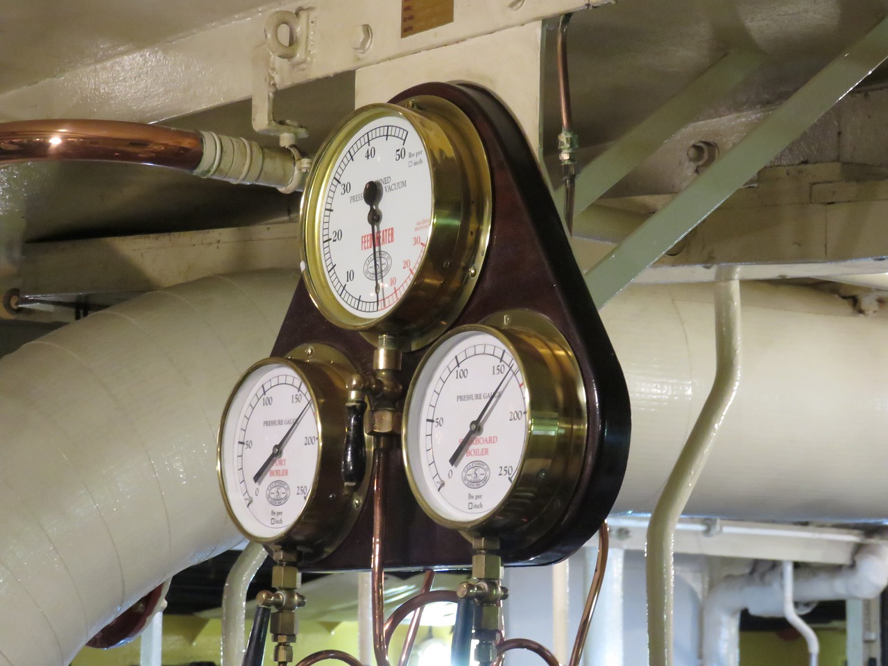 a close up of three gauges on a ship, a portrait, bauhaus, steampunk, photo taken in 2018, 2 0 1 0 photo