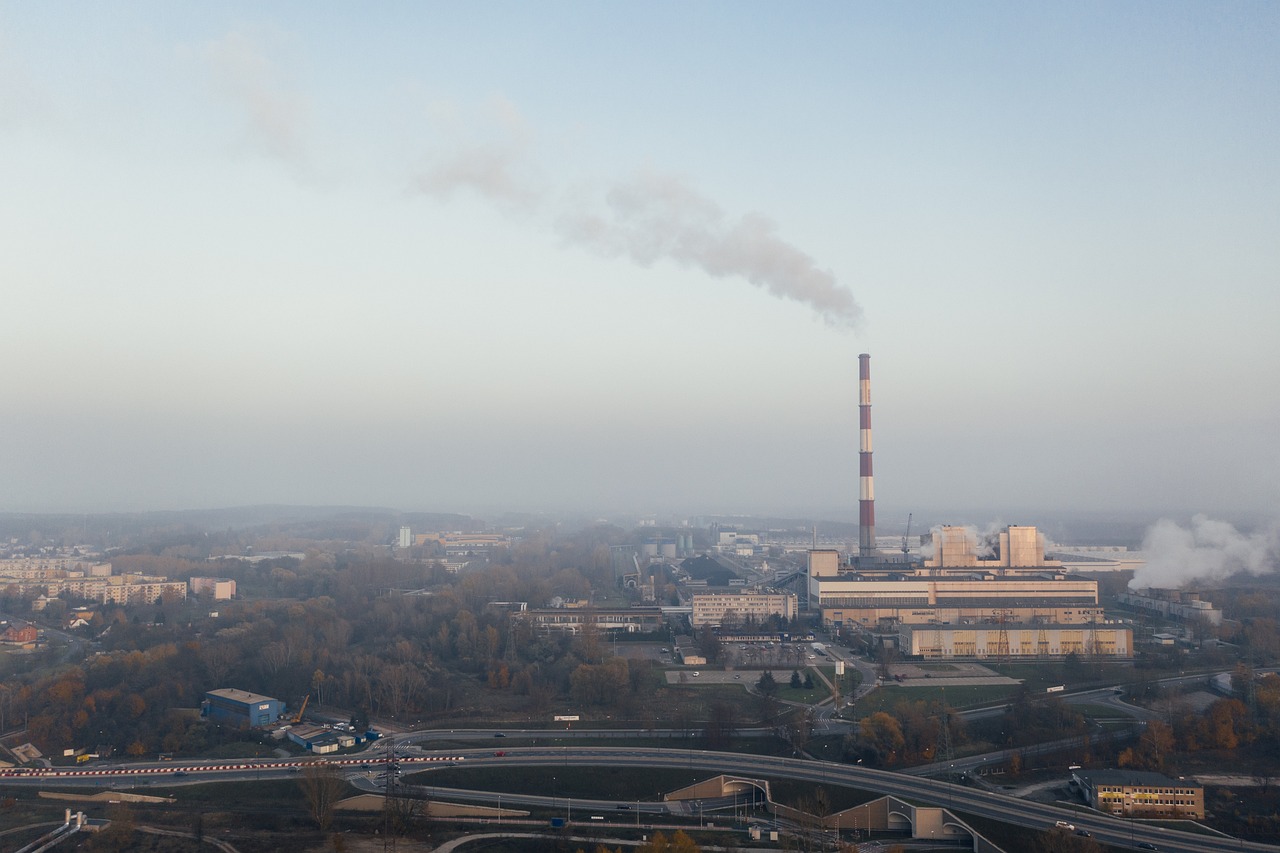 a factory with a lot of smoke coming out of it, a tilt shift photo, warsaw, modern high sharpness photo