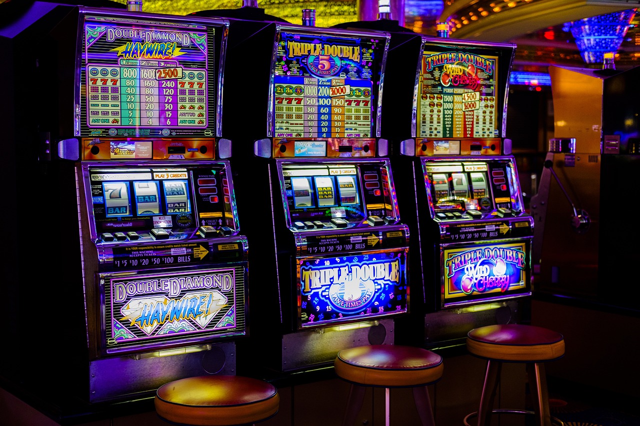 a row of slot machines in a casino, a screenshot, by William Berra, shutterstock, maximalism, melbourne, snake machine, instagram story, prize winning color photo