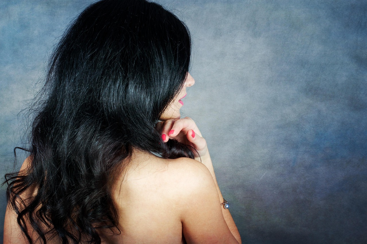 the back of a woman with long black hair, inspired by Elsa Bleda, flickr, art photography, color studio portrait, flirting, half body portrait of juliana, beautiful sexy woman photo