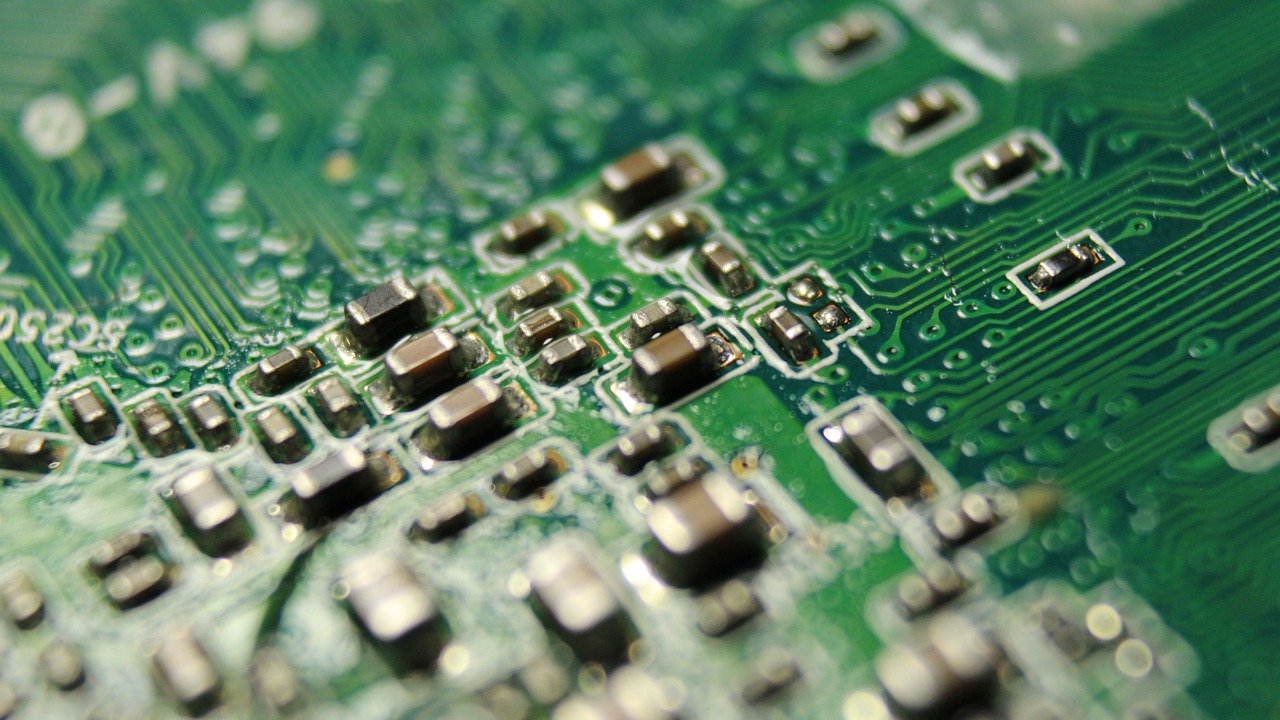 a close up of a printed circuit board, by Edward Corbett, flickr, green technology, dirty, on a sunny day, maintenance